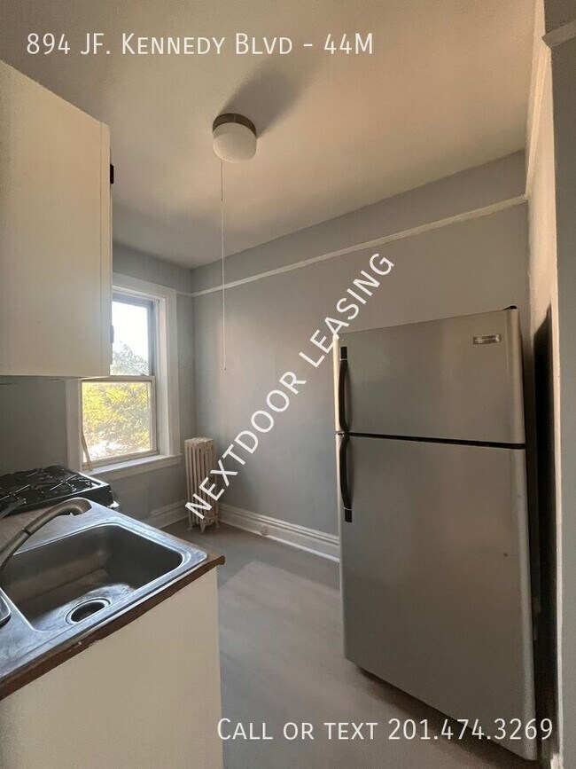 Building Photo - 894 John F. Kennedy Blvd Building Photo - 894 John F. Kennedy Blvd