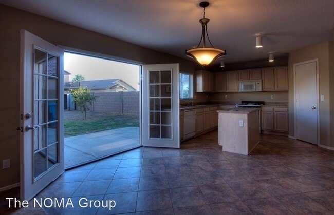 Building Photo - 3 br, 2.5 bath House - 6047 W. Encinas Ln.