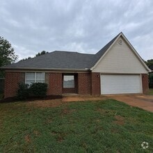 Building Photo - Welcome to this charming 3 bedroom, 2 bath...