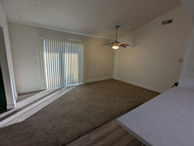 Dining room leading out to private patio and yard - 4918 Saddlerock Way