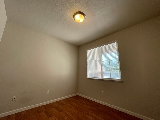 Building Photo - Fireplace in Living Room, Backyard Patio, Hardwood and Laminate Flooring