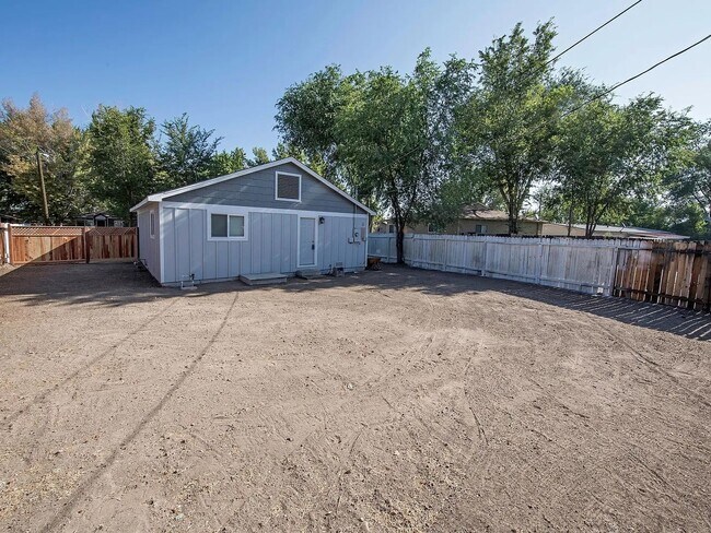 Building Photo - Updated Two bedroom with Large Fenced Yard