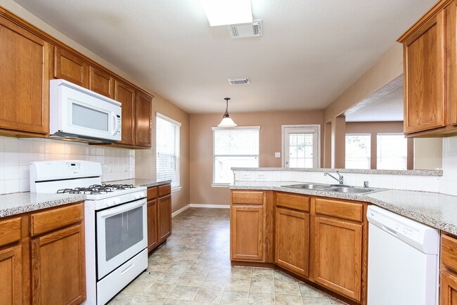 Foto del edificio - 9702 Winter Bloom Ln