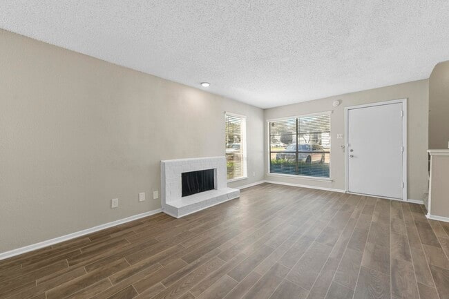 Open floorplan with view of the fireplace - Stone Canyon