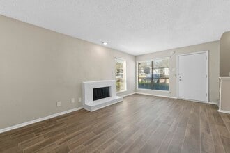 Open floorplan with view of the fireplace - Stone Canyon