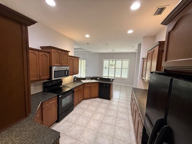 Foto del edificio - Large home in Palm Coast  Plantation