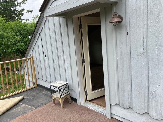 Second level porch over looks cedar creek - W52N677 Highland Dr