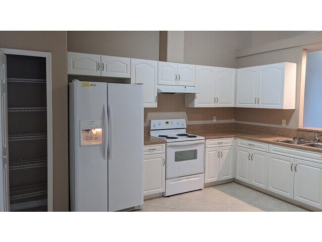 Building Photo - 3/2/1 duplex in Palm Coast, FL       www.W...
