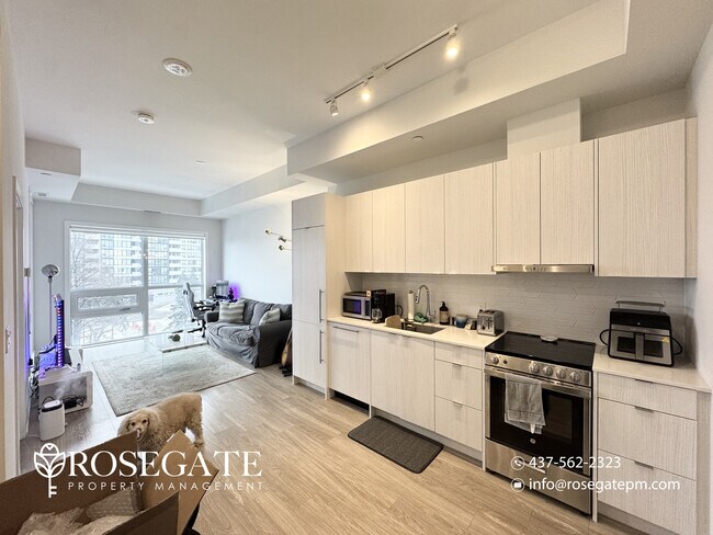 Photo du bâtiment - Modern 1-Bedroom Condo with Balcony & Underground Parking in Mississauga