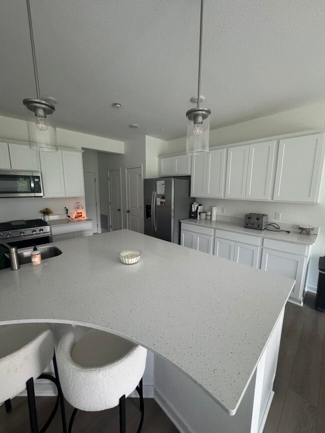 Kitchen with pantry and storage - 21998 Harvest Ave