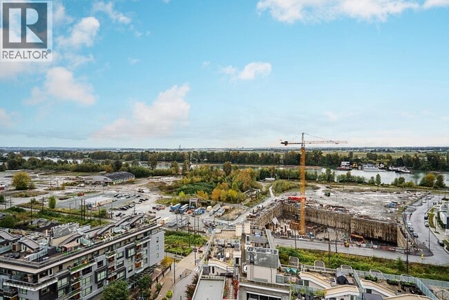 Building Photo - 8533 River District Crossing