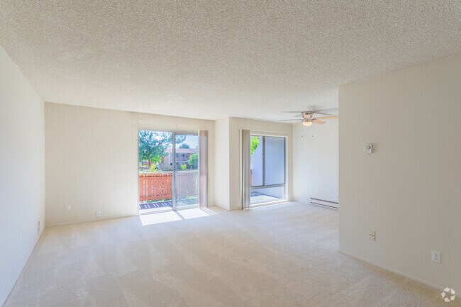 Sala de estar/área de comedor - Oakridge Apartments