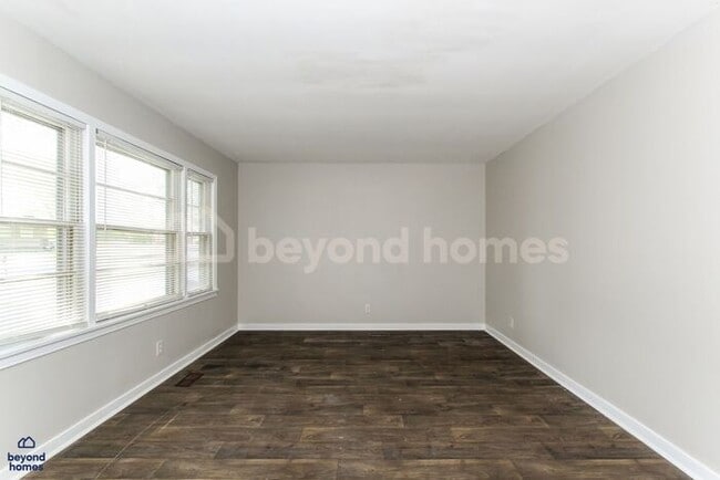 Building Photo - Updated Bungalow with Massive Deck and Fully Fenced Yard!