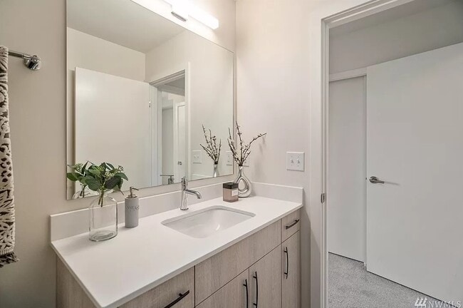 First floor bathroom (attached to bedroom, has shower, no tub) - 9268 50th Ave S