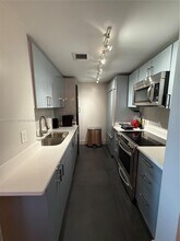 Building Photo - 10275 Collins Ave