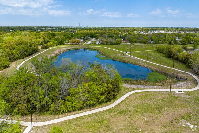 Luedeke Park features a walking trail looping around a scenic pond