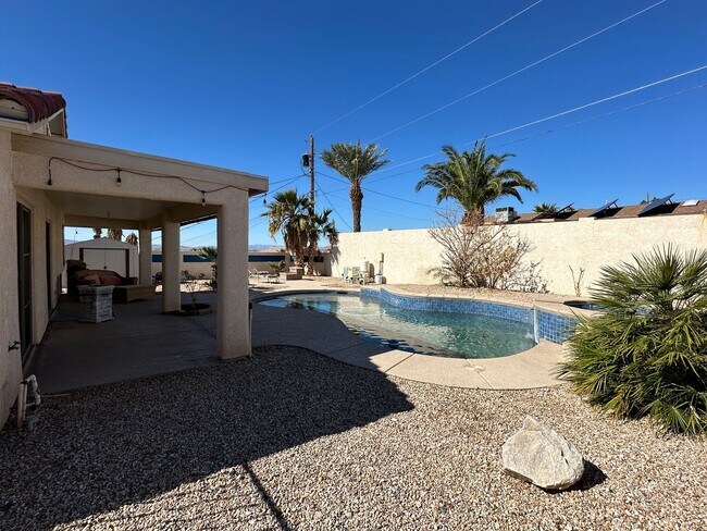 Building Photo - Pending! Unfurnished Long Term Pool Home