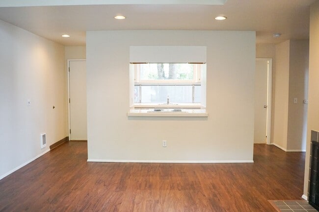 Building Photo - INCREDIBLE SPECIAL! Gorgeous & Bright 1-Bed w/ Wood-Burning Fireplace, W/D, & Private Patio!