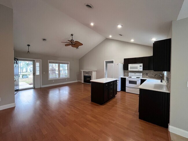 Building Photo - Free month with an eighteen-month lease. A...