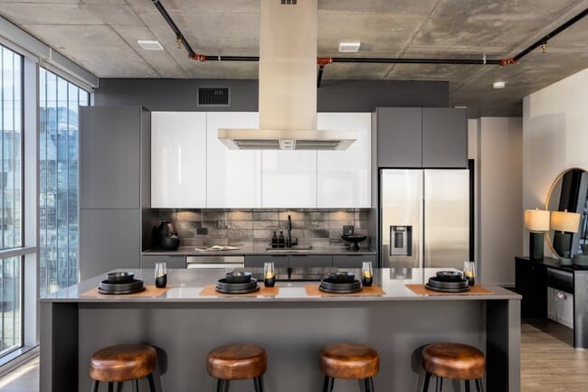 Building Photo - The Place at Fifth + Broadway