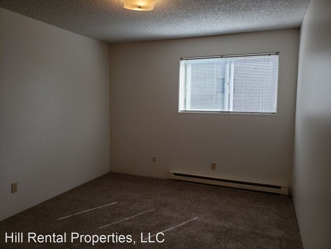 Building Photo - 2 br, 1 bath Apartment - 215 E Henley St.
