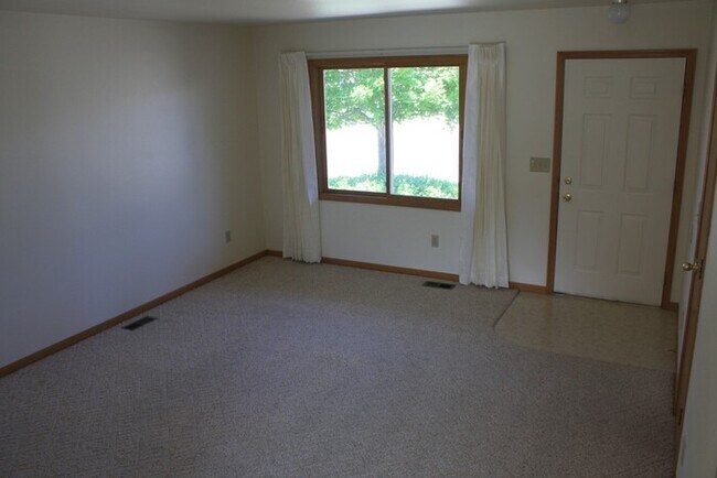 Building Photo - All New Flooring! Huge basement Available ...