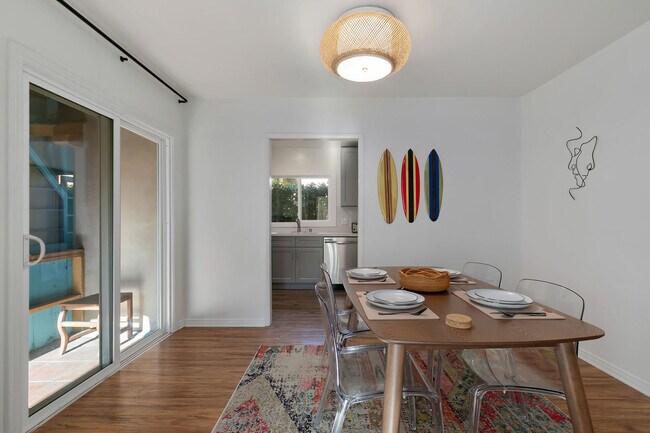 Formal dining room with kitchen in the background - 504 Pacific Ave