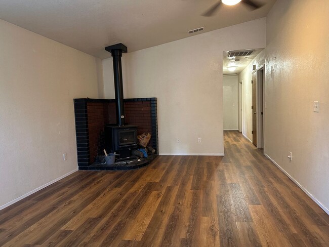 Building Photo - Charming Redding Home with Fireplace & Vau...