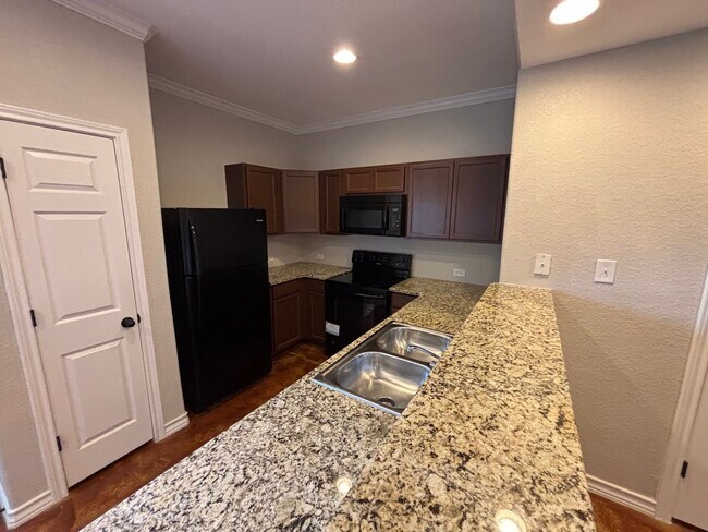 Photo - Spacious 3-Bedroom, 2 Bath, 1 Car Garage. ... Townhome