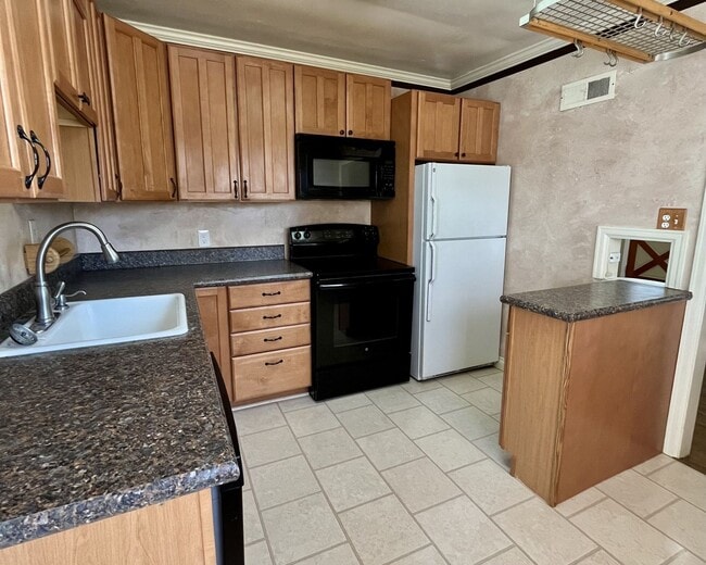 Building Photo - Charming Corner Lot with Large Backyard & ...