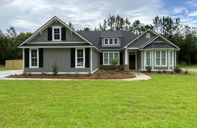 Building Photo - Spacious 4BR/3BA Creekside West Home with Screened Porch, Fenced Yard & 3-Car Garage