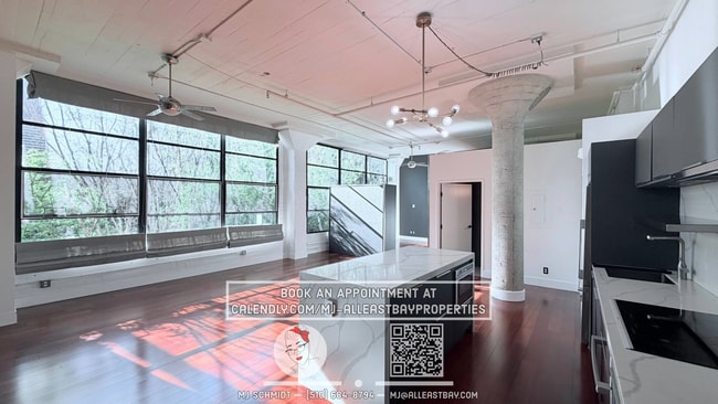 Building Photo - Sunny loft with in unit gym, heated floors in bathroom, contemporary kitchen, and includes water/...