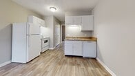Step into a world of endless possibilities in this beautifully designed 330 sq ft haven. The moment you enter, you'll be captivated by the seamless flow of the open-concept layout, where every inch is thoughtfully utilized to maximize your living experience.

The heart of this home is the stunning kitchen, boasting pristine white cabinetry that gleams under modern lighting. Sleek appliances and golden-hued countertops add a touch of luxury, while ample storage space caters to your culinary adventures. The adjacent living area, with its warm wood-look flooring, invites you to create a cozy retreat for relaxation or entertaining.

Your private sanctuary awaits in the generously sized 100 sq ft bedroom. Plush carpeting underfoot and a large window filling the space with natural light create an atmosphere of tranquility. Envision peaceful mornings and restful nights in this personal oasis.

The bathroom is a testament to modern design, featuring a contemporary vanity, sparkling fixtures, and a spacious tub-shower combination. It's the perfect space to prepare for your day or unwind in the evening.

Throughout the home, neutral tones provide a blank canvas for your personal style to shine. Whether you're a first-time homebuyer, downsizing, or seeking an investment opportunity, this property offers the ideal foundation for your aspirations.

Located in the heart of Murfreesboro, this home places you at the center of a vibrant community. Embrace the freedom of low-maintenance living while enjoying all the amenities of this thriving city.

Don't miss this chance to own a piece of real estate that combines efficiency, style, and potential. Your journey to a brighter future starts here – welcome home!