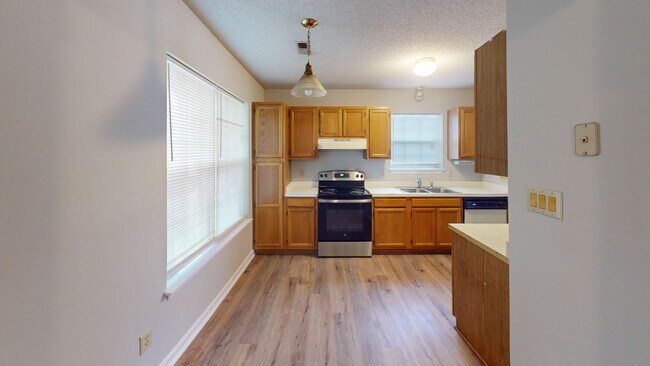 Photo - Charming one-story 1st level end unit condo