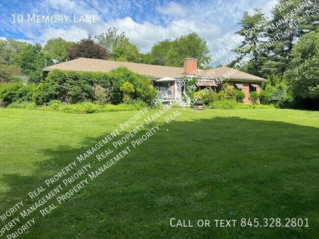 Foto del edificio - Fully Furnished 3 BR Home in Tranquil Comm...