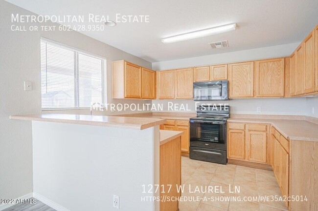 Foto del edificio - 12717 W Laurel Ln