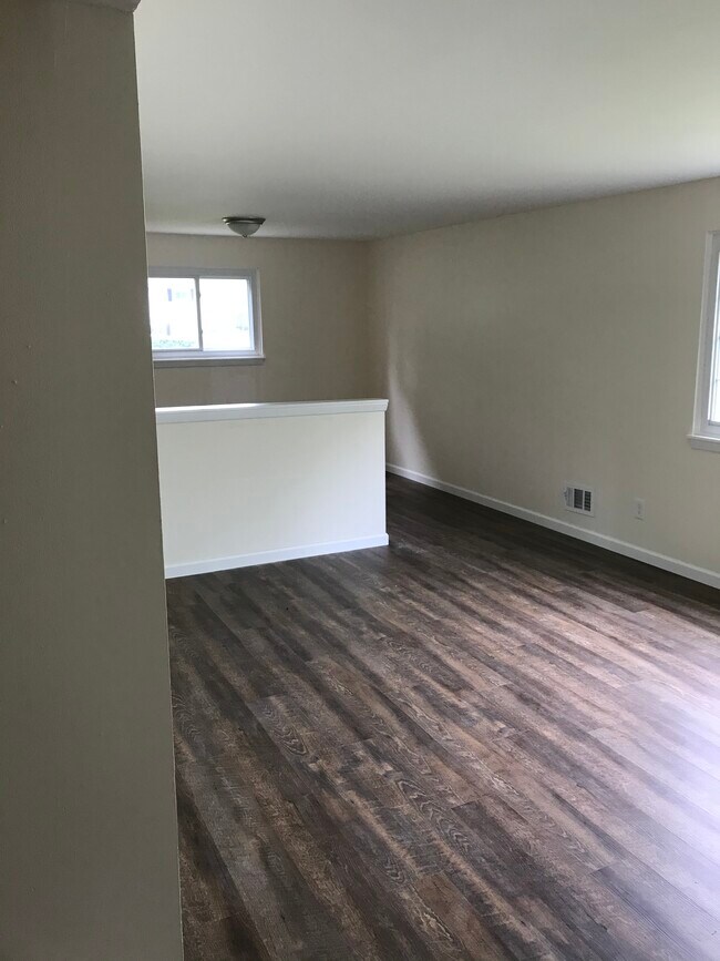 Living room and dining room. - 29 Harwin Dr