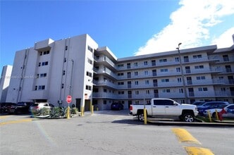 Building Photo - 9911 W Okeechobee Rd