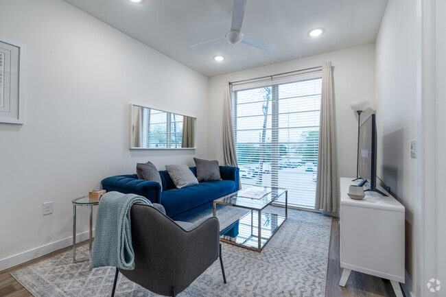 1BR, 1BA - 600SF - Living Room - CO/OP Maple