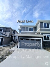 Building Photo - 16517-16520 20 Ave SW