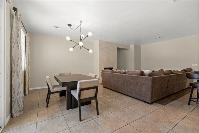 Building Photo - Spacious, Stylish & Partially Furnished 3-Bedroom Home with Attached Garage