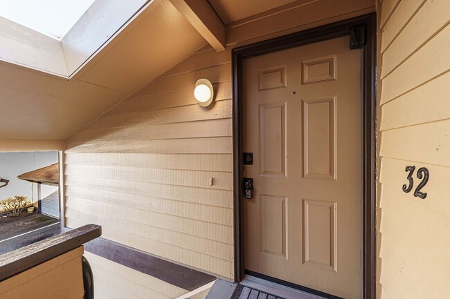 Photo - Updated 1 Bed / 1 Bath Upper-Level Condo with Balcony, Garage & A/C — Gated Community!