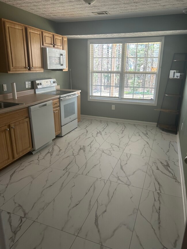 Kitchen-newly renovated floor - 70 Trelawney Dr
