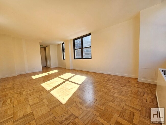 Building Photo - Corner 1-Bedroom in Midtown East | 11th Floor, Full-Service Building