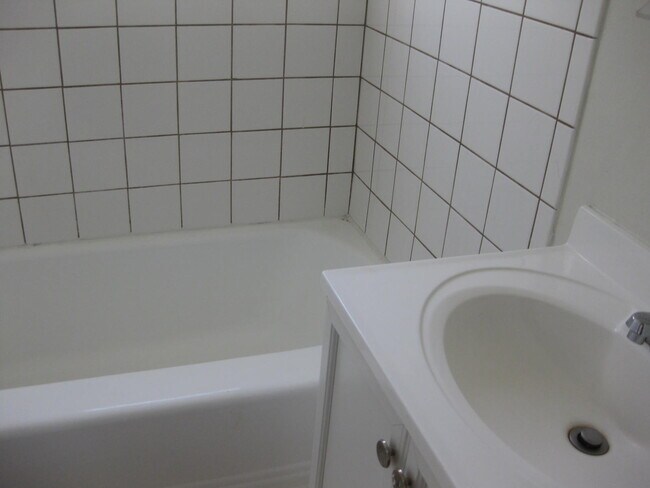 bathroom with tub - 523 Webster St