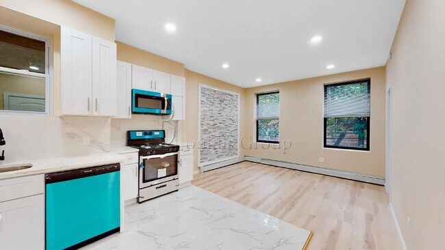 Photo - ** GUT RENOVATED ** 3 BEDROOM ** PRIME ASTORIA ** 2 MIN TO N/W Townhome