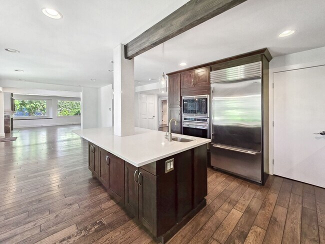 Building Photo - Stunning 4-Bedroom Home with Luxurious Mas...