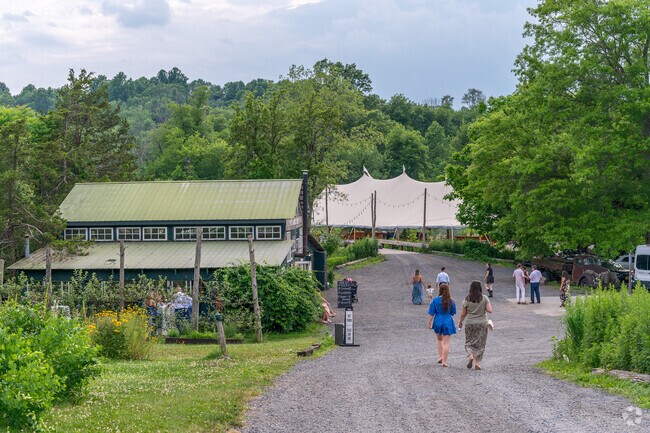 Explore Blooming Hill Farm, where you'll find fresh, local produce and a stunning backdrop.