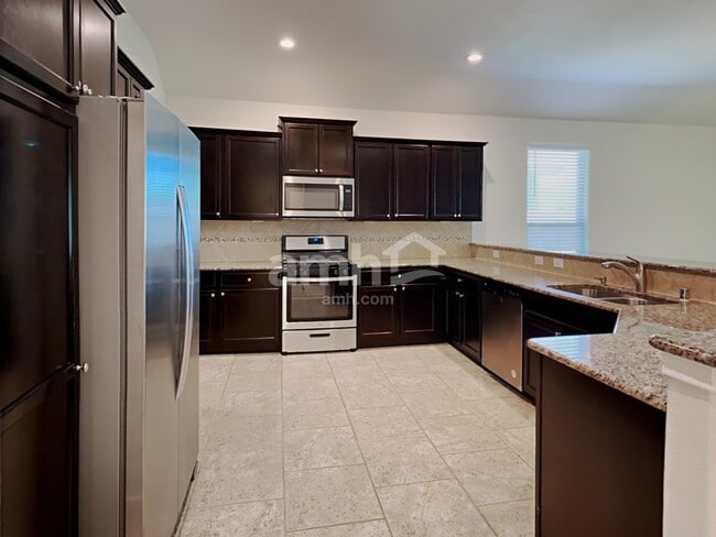 Building Photo - 21614 Champagne Dr E
