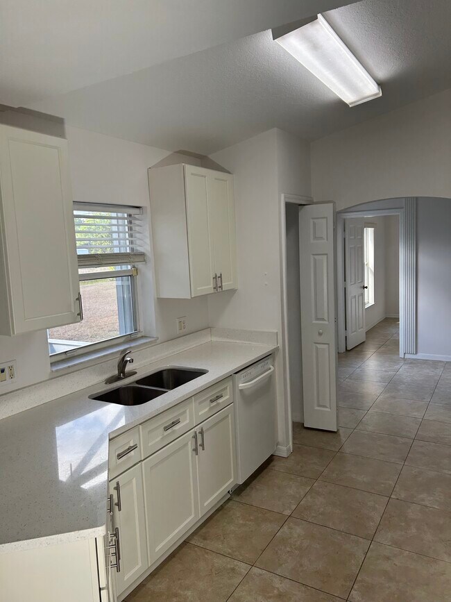 Building Photo - 6480 NW Volucia Dr